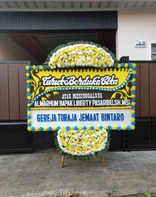 Papan Bunga Duka di Pabean